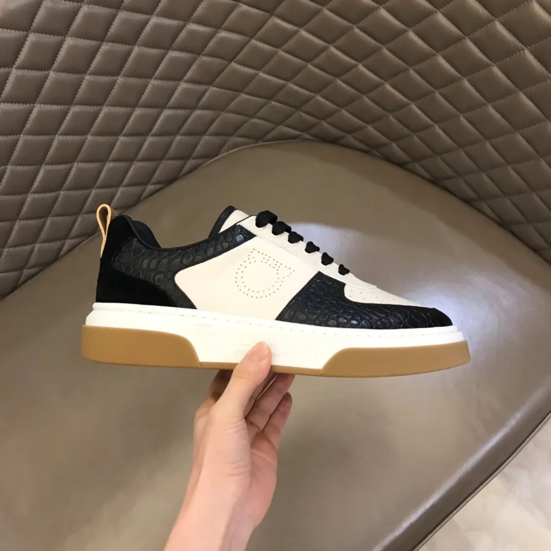 p440 "Salvatore Ferraga**" men's low-top fashion sneakers. This casual shoe has a novel structure and is made of soft calfskin. The contrasting color elements on the upper highlight the bold and avant-garde atmosphere. The first-layer cowhide lining is high-end and comfortable. Energetic and fresh, these shoes can be worn with casual looks or add a touch of street style to elegant trousers.  Size: 38-44
